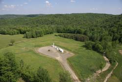 6. Shale gas production plant in the Appalachians. Visually as intrusive as a piggery, and probably generating far less methane into the atmosphere. Photo © J.B. Earl & Statoil.